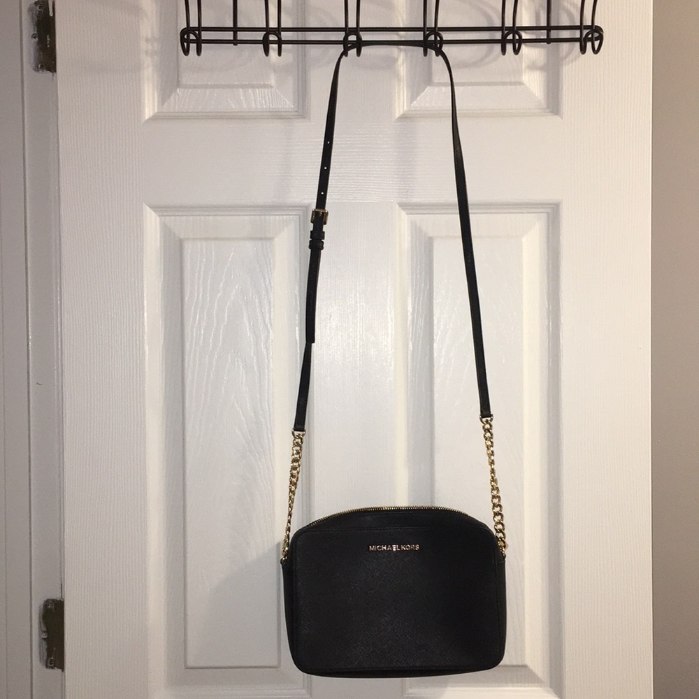 Black and gold Michael Kors cross body bag